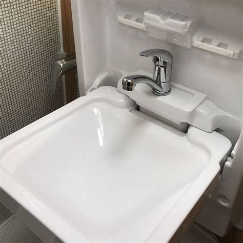 cleo tip up sink folding vanity basin